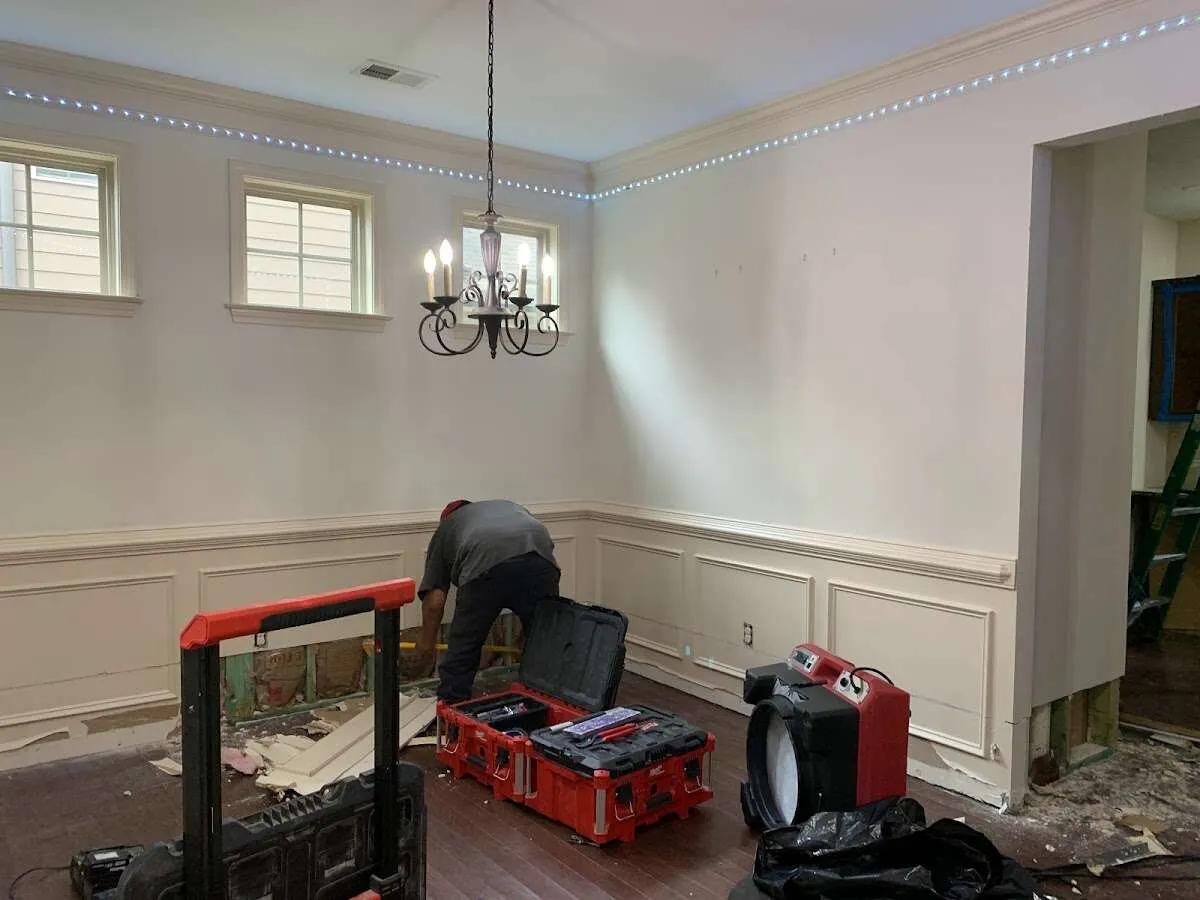 Restoration technician with professional equipment in Edgewater Park